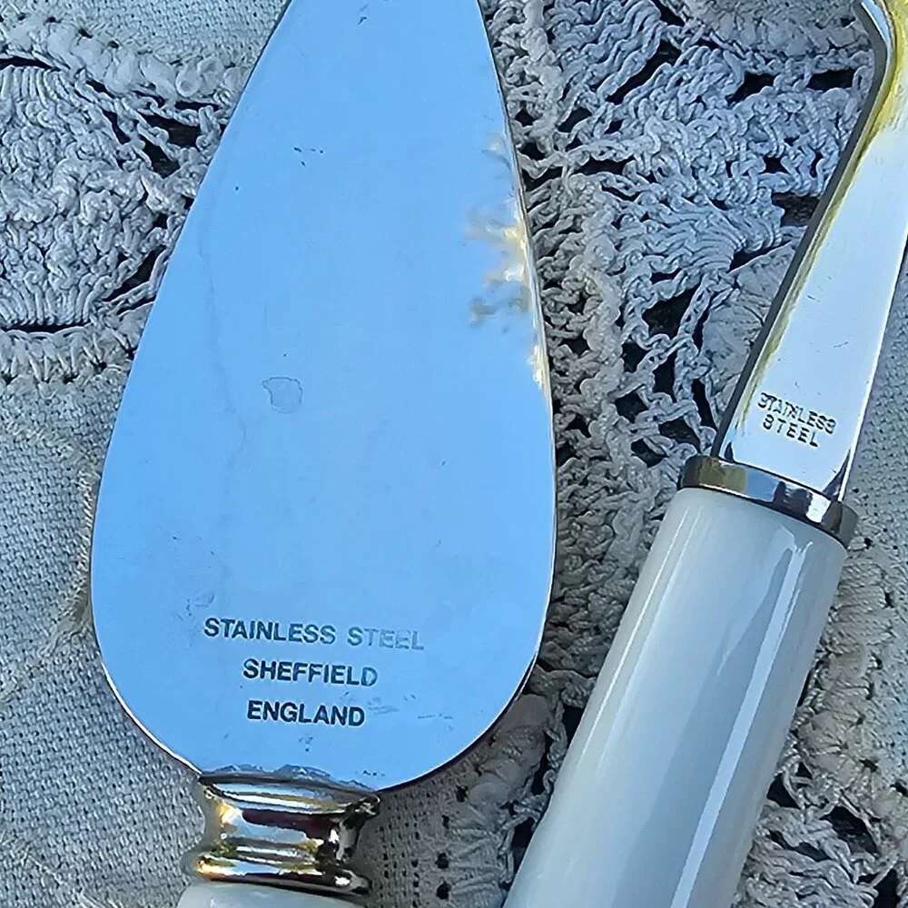 Christmas Sheffield soft cheese spreader and plane stainless w ceramic handles